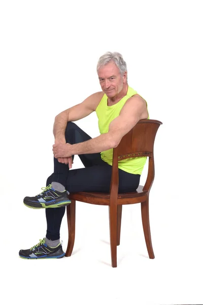 Side View Man Sportswear Tights Fluorescent Yellow Sleeveless Sitting Chair — Foto de Stock