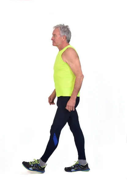 Side View Senior Man Sportswear Walking White Background — Zdjęcie stockowe