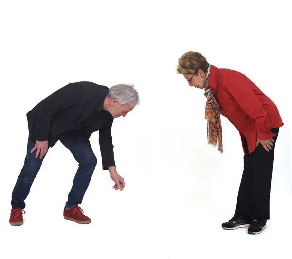 Senior Couple Searching Floor White Background — Photo