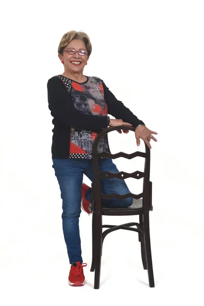 Senior Woman Playing Wiyh Chair White Background — Fotografia de Stock