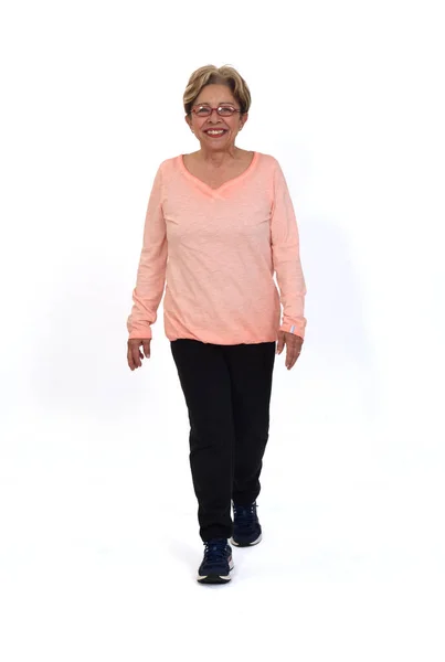 Front View Senior Woman Walking White Background — 스톡 사진
