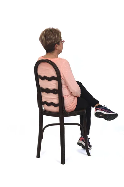 Back View Senior Woman Sitting White Background — 스톡 사진