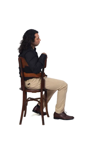 Side View Man Shirt Shoes Pants Sitting Chair Looking Away — Stockfoto