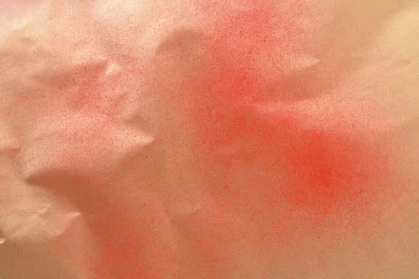 Red Spray Paint Gold Colored Paper — Fotografia de Stock