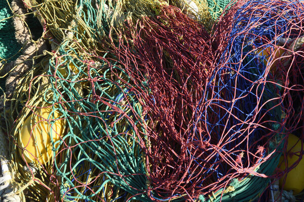 close up of a colorful of a fishing net 