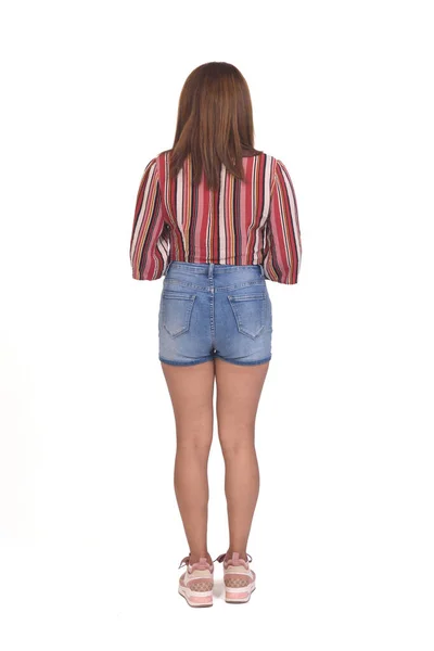 Visão Traseira Uma Mulher Com Shorts Tênis Fundo Branco — Fotografia de Stock