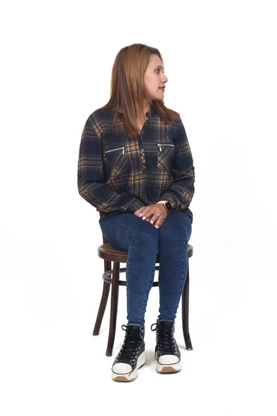 Front View Woman Sitting Chair Looking Away White Background — Stok fotoğraf