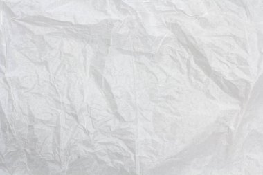 Beyaz buruşmuş kağıt doku arka planı. Beyaz kumaş dokusu kumaşı katlar.