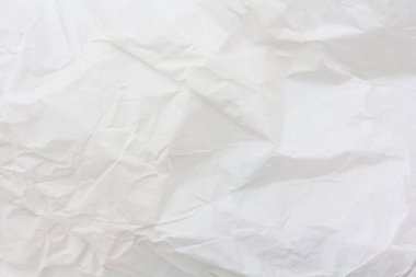 Beyaz buruşmuş kağıt doku arka planı. Beyaz kumaş dokusu kumaşı katlar.