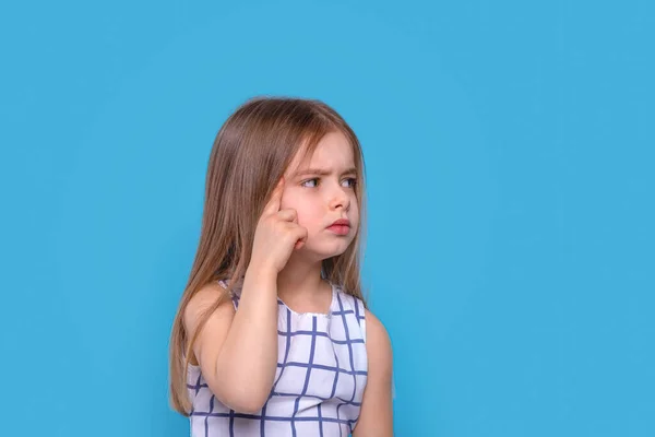 Waist Portrait Young Girl Thinking Some Serious Problem Blue Background — 图库照片