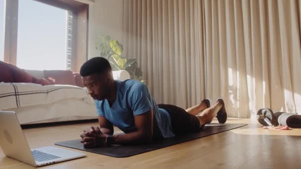 Young Black African American Male Working Out Home Holding Plank — Stockvideo