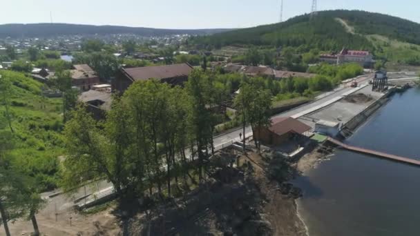 Aerial View Reconstruction Embankment Provincial Town Cyclists Ride Sidewalk Nearby — Stock Video