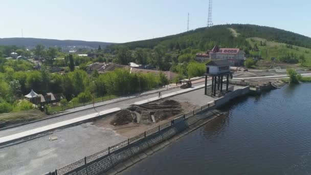 Aerial View Construction Embankment Provincial Town Cyclist Rides Sidewalk Dam — Stock Video