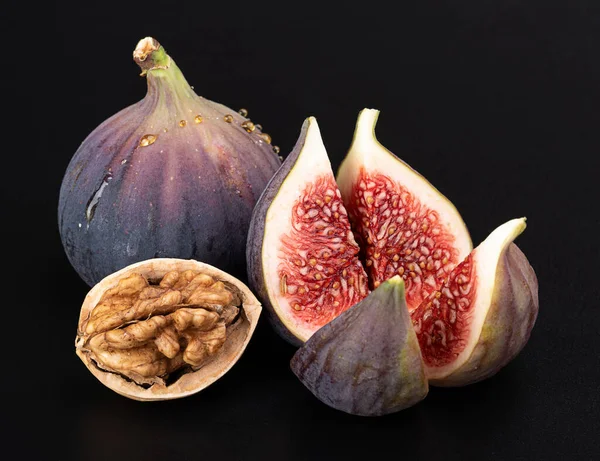 Figs Walnuts Isolated Black Background — стоковое фото