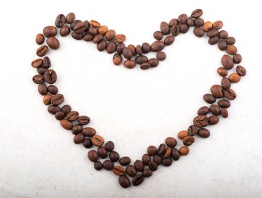 Kahve çekirdeğinden yapılmış bir kalp. Üst Manzara. Metnin intikamı