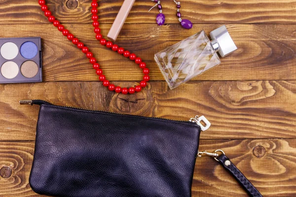 Women Accessories Wooden Background Clutch Bag Bottle Perfume Eye Shadow — Stock Photo, Image
