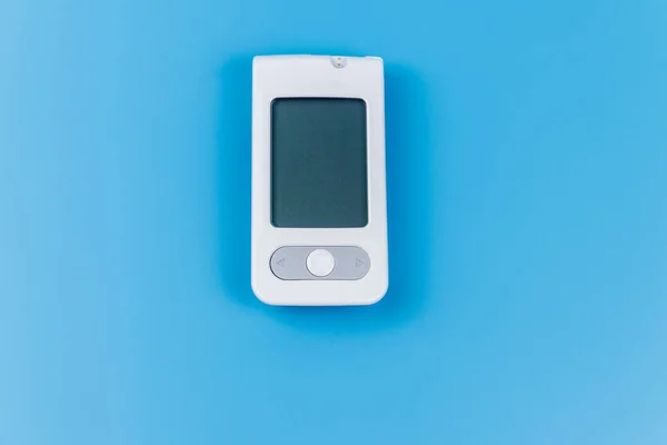 Digital Glukometer Pastellblå Bakgrund Diabetesbegreppet — Stockfoto