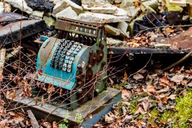Abandoned old cash register in the ghost town Pripyat in Chernobyl Exclusion Zone, Ukraine clipart