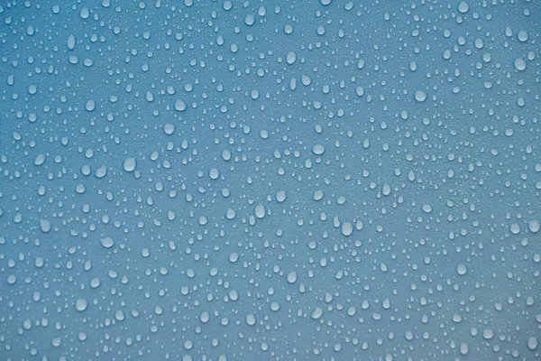 Krople Deszczu Niebieskiej Folii Plastikowej — Zdjęcie stockowe