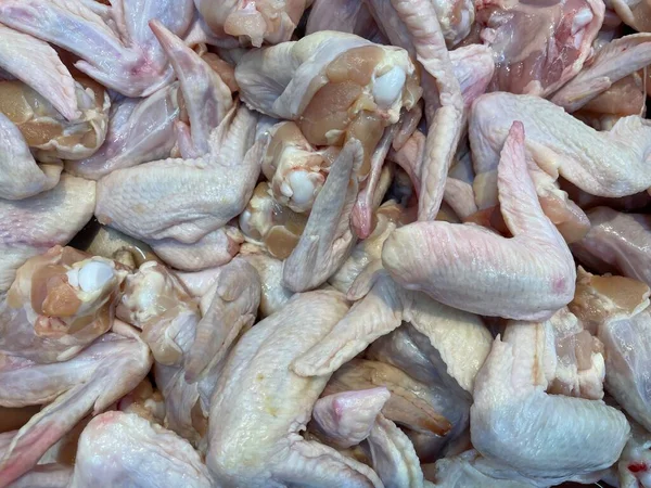 fresh raw chicken 3 joint wings for sale in supermarket