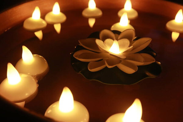 Candlelight For Special Holidays. Candles in Water. Reflection and Relaxation. Diwali Holidays