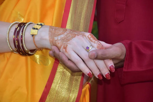 Groom Holding Hand Of Bride. Indian Ring Ceremony.