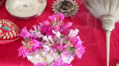 Rituals With Flowers and Aroma Candles In Jain Temple. Mahavir God