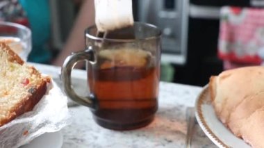 Tea bag add in cup. Time for Cup of tea. Fresh and hot tea. Transparent Glass for Wine. 