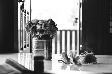 Gerbera Bouquet In Vase and On Table. Lovely Interior With Daisy flowers In Black and white colors.