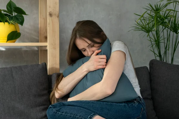 Girl Hugs Pillow While Sitting Couch Young Woman Upset Lonely — Stock Photo, Image