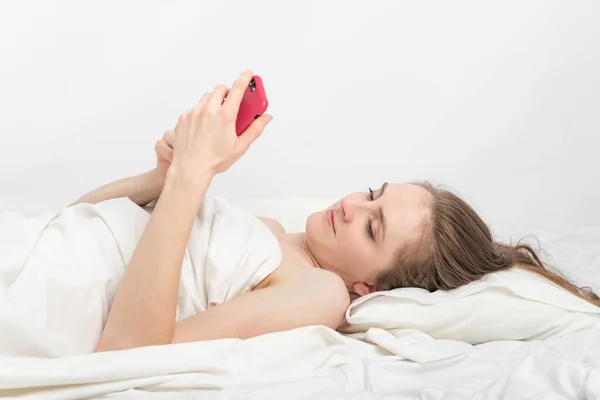 Young Woman Lies Bed Phone Corresponds Friends Social Media Addiction — Stock Photo, Image