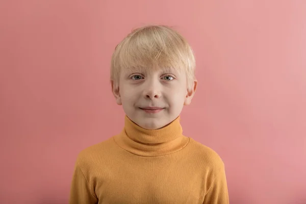 Fair Haired Boy Orange Jacket Pink Background Close Portrait Six — Zdjęcie stockowe