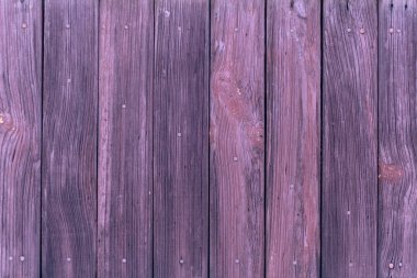 Mor boyayla boyanmış tahtalar. Eski ahşap dokular. Soyut tahta arkaplan
