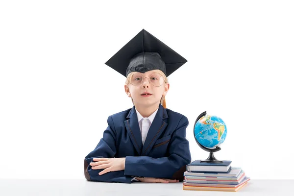 Primary School Boy School Uniform Large Glasses Student Hat Sits — Zdjęcie stockowe