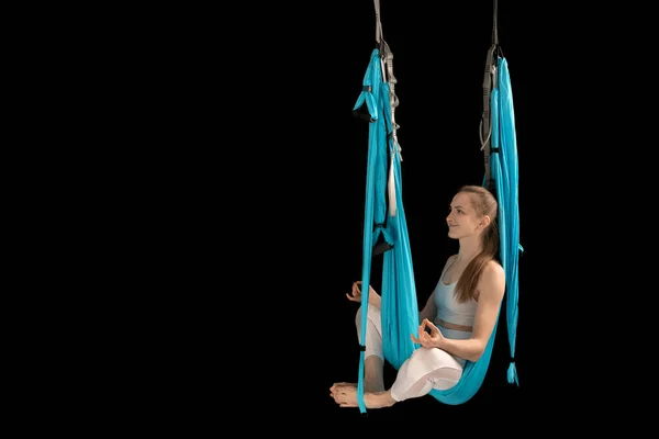 Woman Sits Lotus Pose Hammock Practicing Aerial Yoga Black Background — Stock Photo, Image