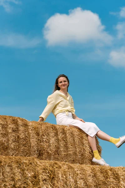 Portrait Happy Young Woman Sitting High Haystack Blue Sky Background — Photo