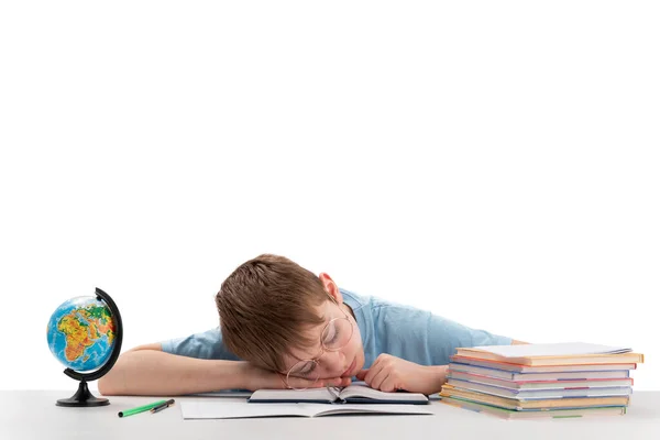 Caucasian Schoolboy Glasses Tired Lessons Sleeps His Desk While Doing — Zdjęcie stockowe