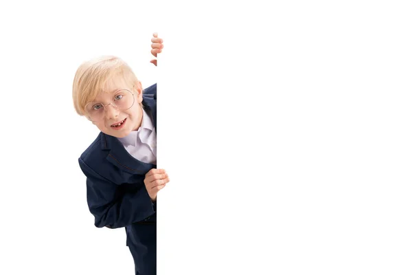 Cheerful Blond Boy Big Glasses School Uniform Peeking White Backdrop — Stockfoto