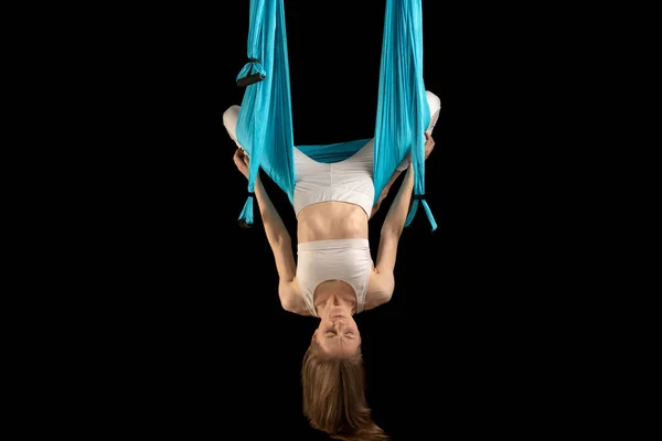 Young Girl White Sportswear Does Fly Yoga Stretches Black Background — Stock Photo, Image