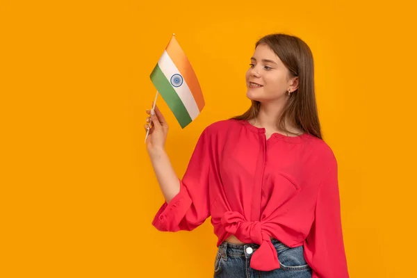 Portrait Smiling Young Girl European Appearance Flag India Orange Background — Fotografie, imagine de stoc