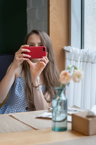 Young Woman Sits Table Cafe Takes Selfie Girl Coffee Shop — Stock Photo, Image