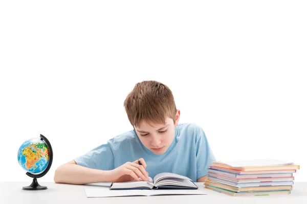 Smiling Boy Sits Table Stack Notebooks Doing Homework Education Abroad — Fotografia de Stock
