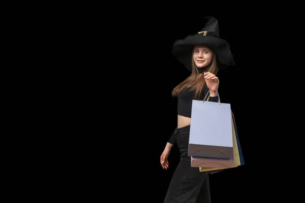 Young Witch Pointed Hat Successful Shopping Holds Paper Bags Isolated — Stock Photo, Image