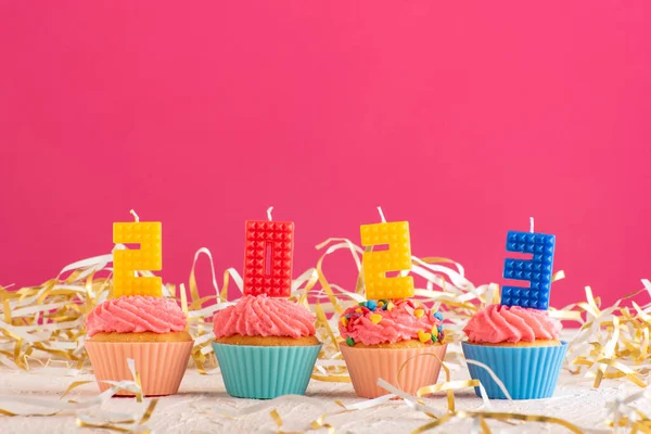 Delicious Cupcakes Decorated Candles Form Numbers 2023 Pink Background New — Stock Photo, Image