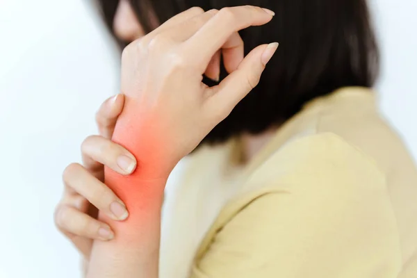 Wrist pain in the young women or diseases related to rheumatism. Concept of health problems.