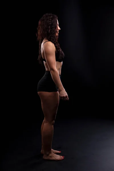 Strong Fitness Woman Bodybuilder Black Hair Tanned Body Posing Studio — Stock Photo, Image
