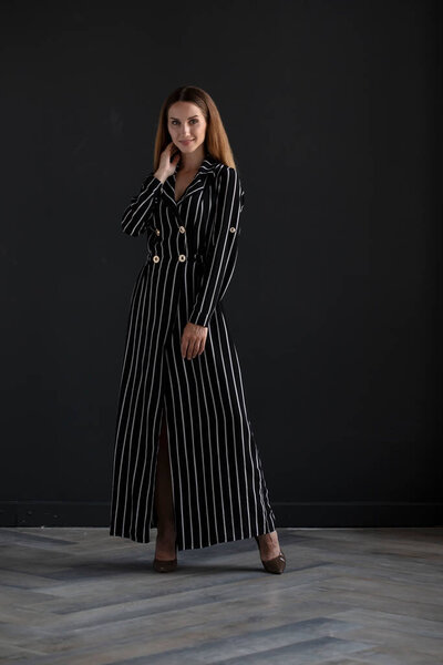 young beautiful  woman posing in studio