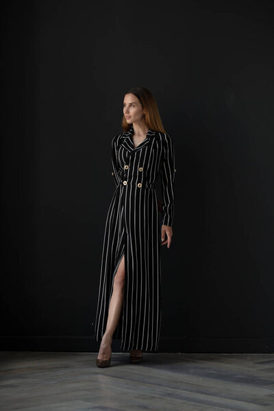 young beautiful  woman posing in studio