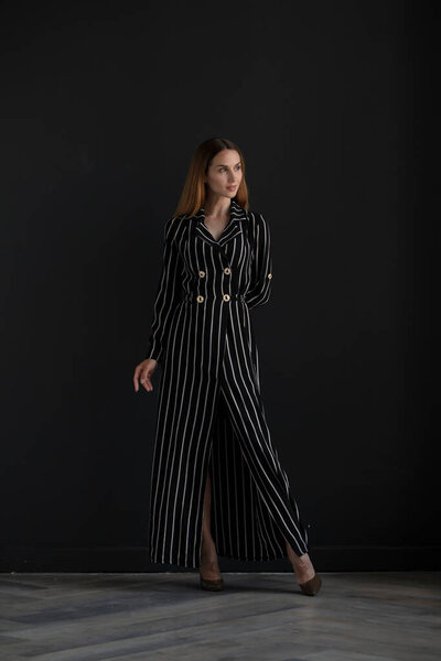 young beautiful  woman posing in studio