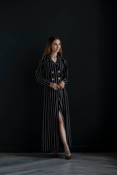 young beautiful  woman posing in studio